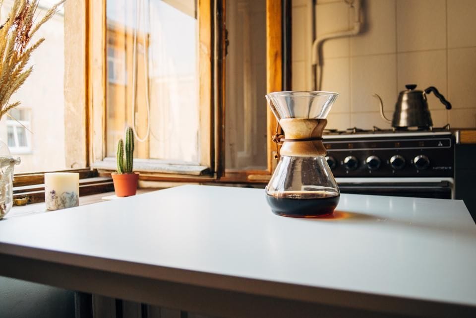 A coffee pot on the new counter in morning light