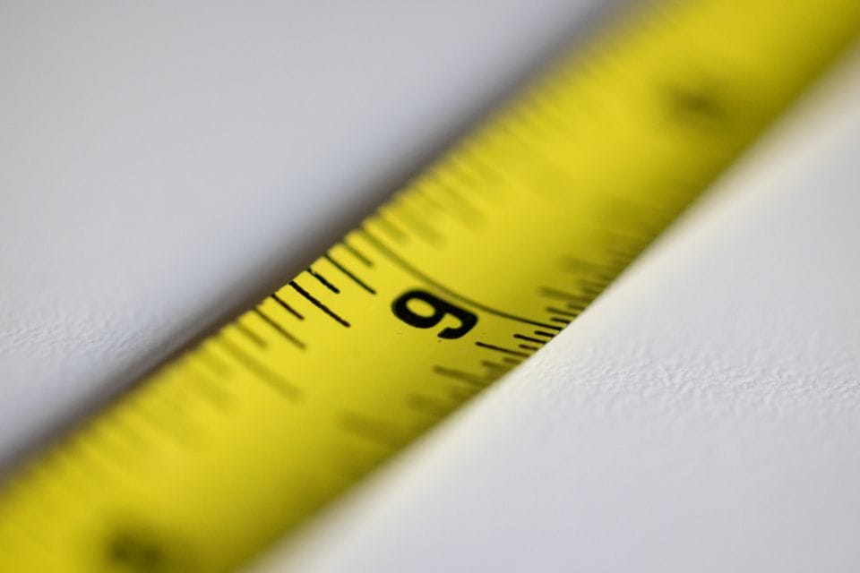 A close-up of a yellow tape measure