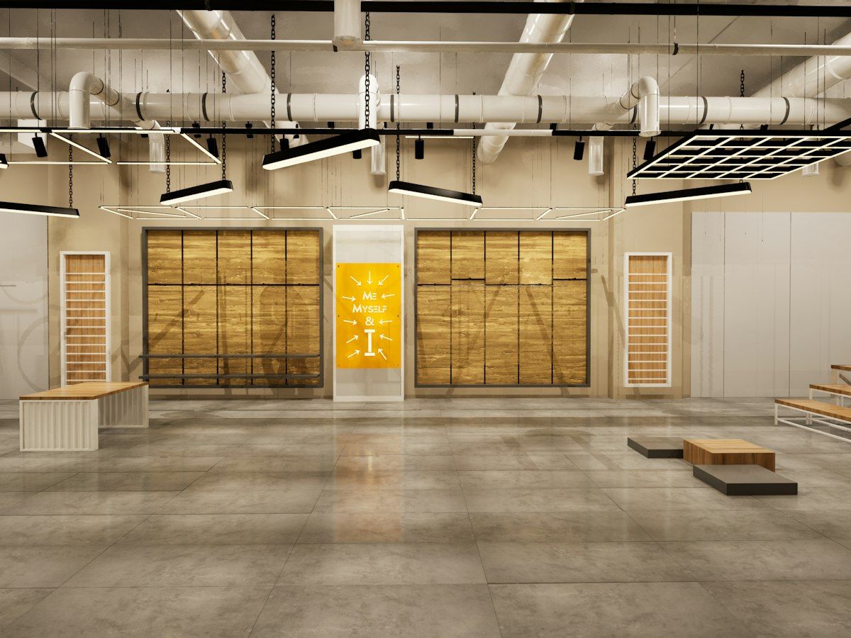An empty store interior with an exposed ceiling, ready for fixtures