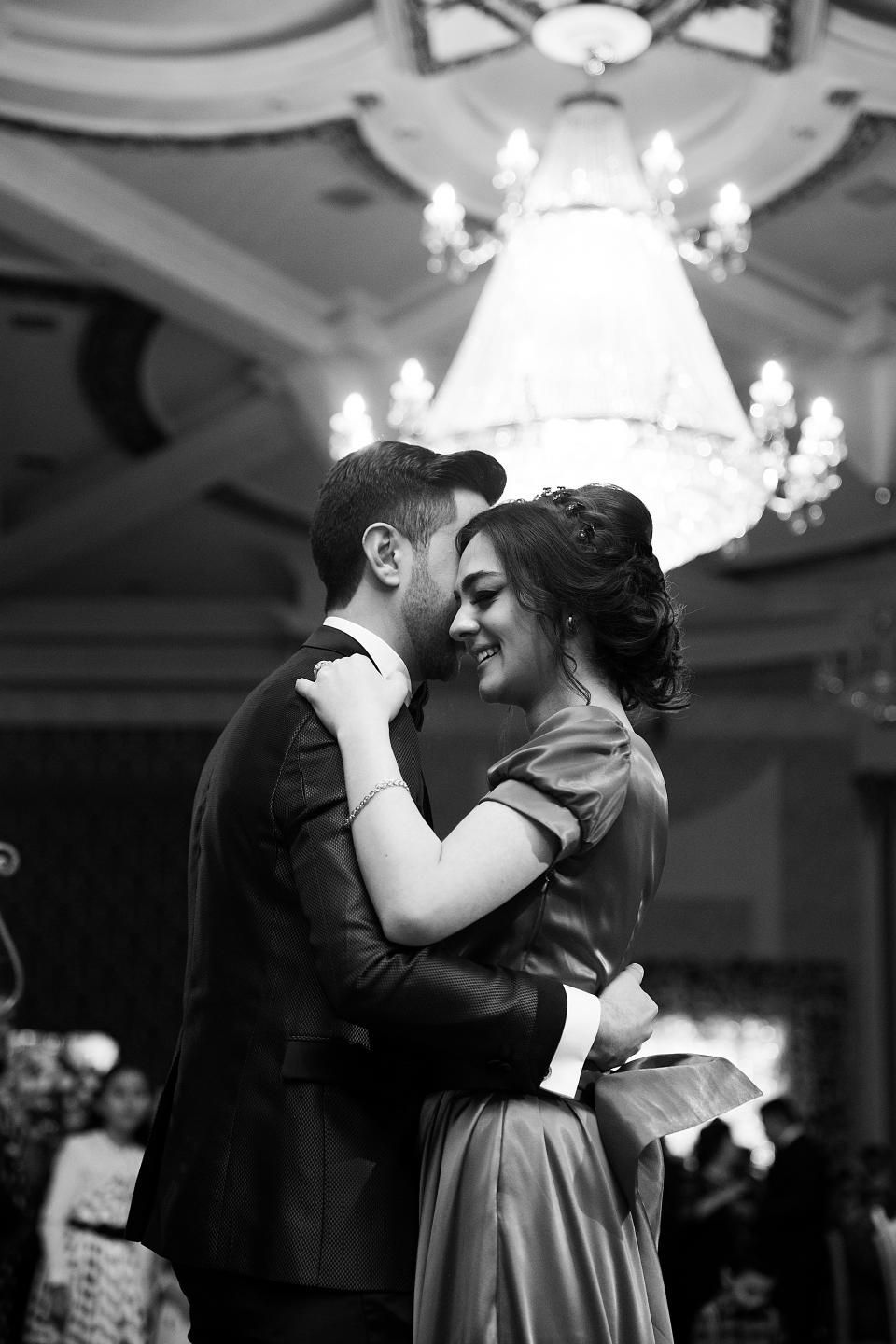 First dance under a chandelier
