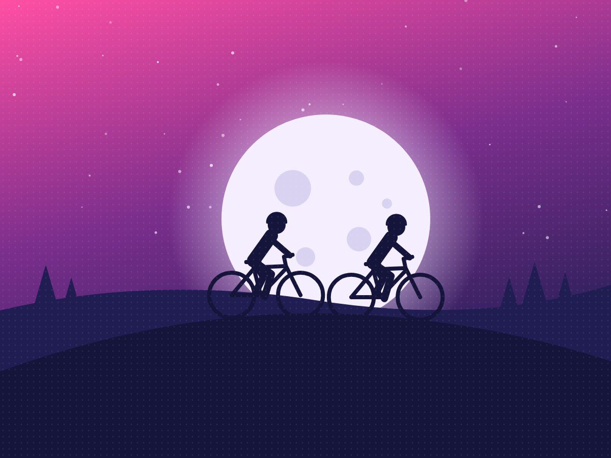 Two bikes on a hilltop under a huge full moon
