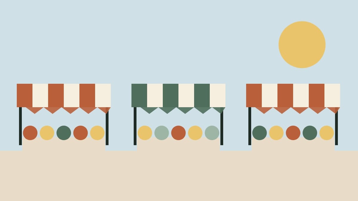 Three striped market stalls with crates of fruit and vegetables under a blue sky